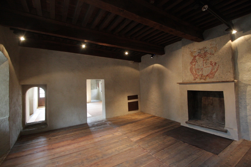 Drawing room  with coat of arms on the chimney